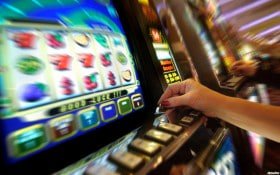 Infinite Blackjack hand decision interface on triad4d showing hit, stand, double, and split buttons.